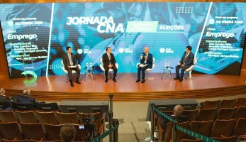 4 homens sentados no auditório do jornada CNA